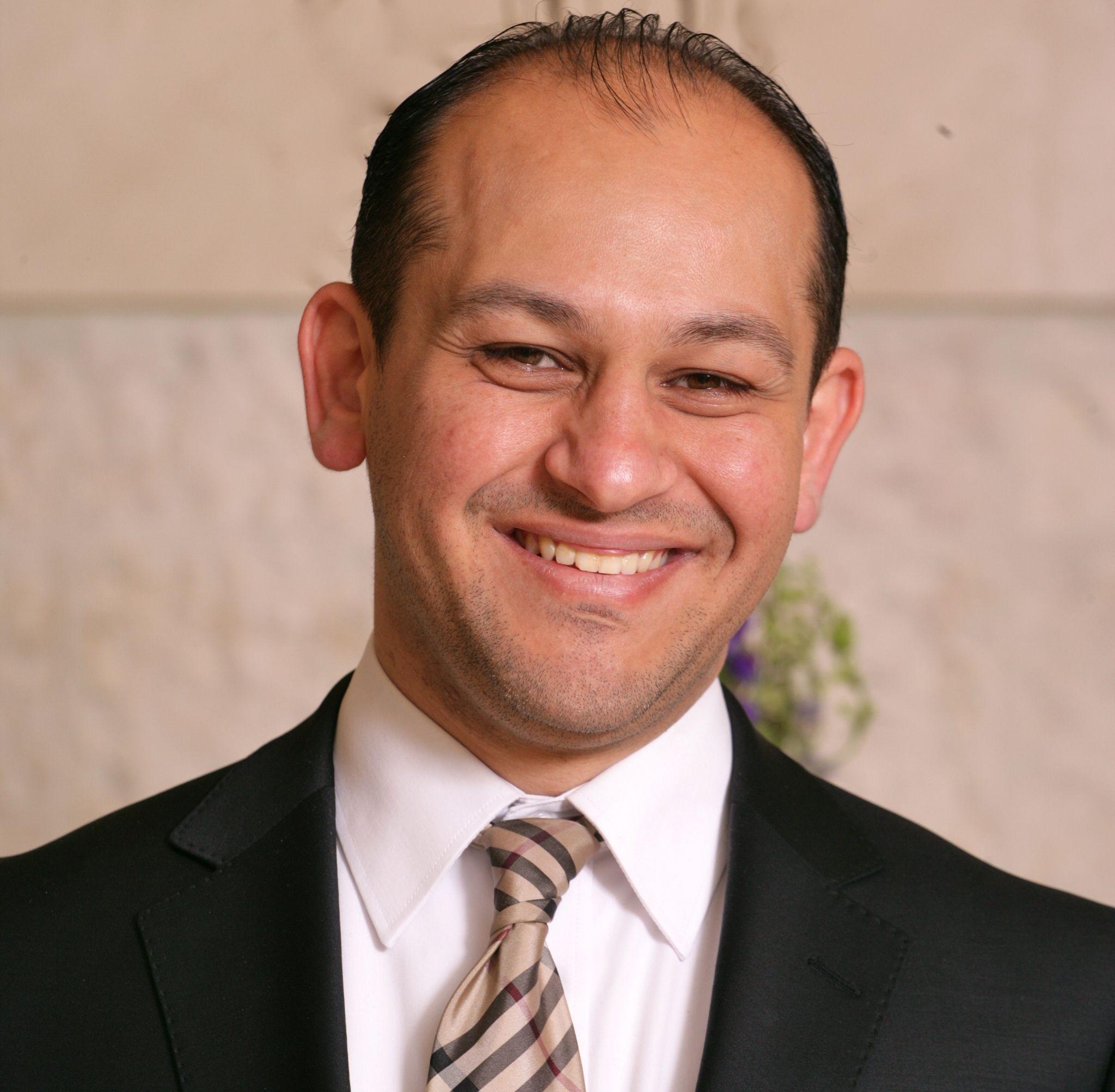 Rami Al-Karmi logo